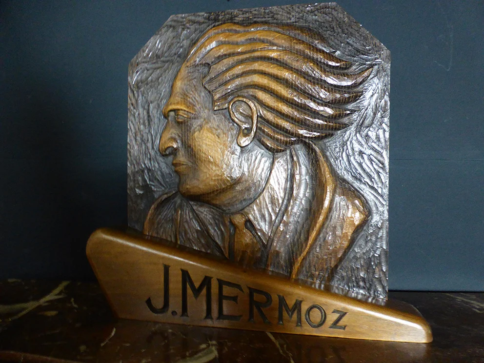 CARVED PANEL OF JEAN MERMOZ