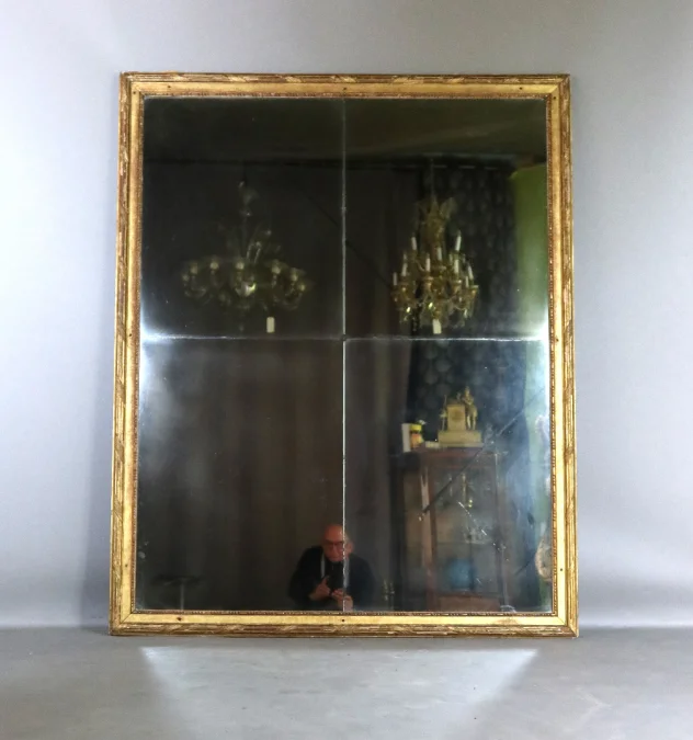 Grand miroir en bois doré fin XVIII début XIX