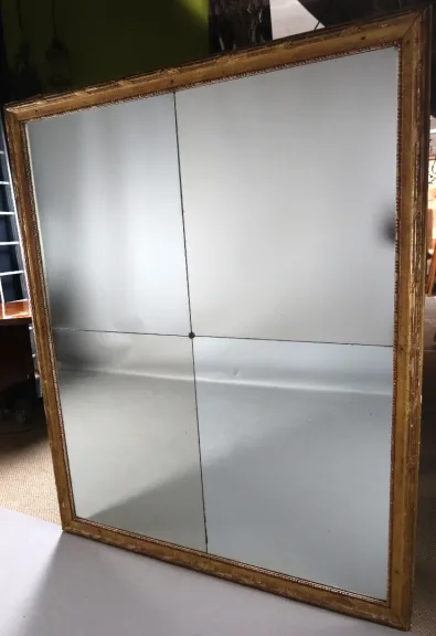 Grand miroir en bois doré fin XVIII début XIX