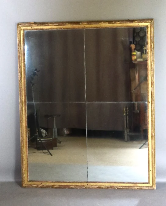 Grand miroir en bois doré fin XVIII début XIX