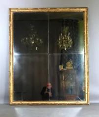 Grand miroir en bois doré fin XVIII début XIX