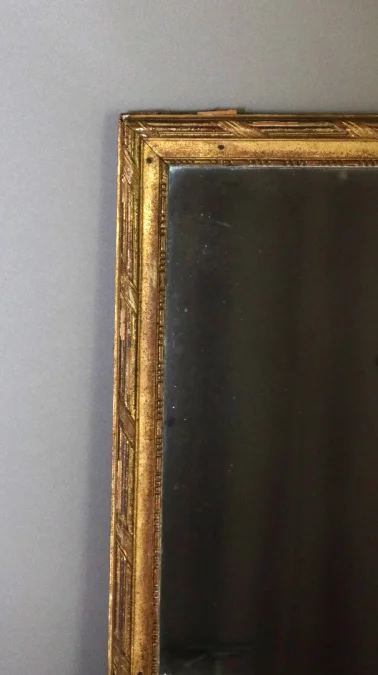 Grand miroir en bois doré fin XVIII début XIX
