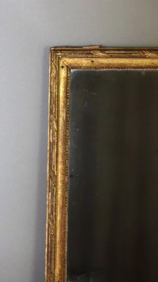 Grand miroir en bois doré fin XVIII début XIX
