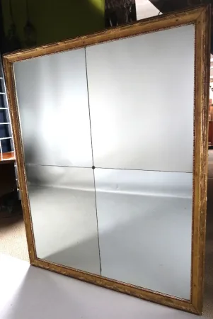 Grand miroir en bois doré fin XVIII début XIX