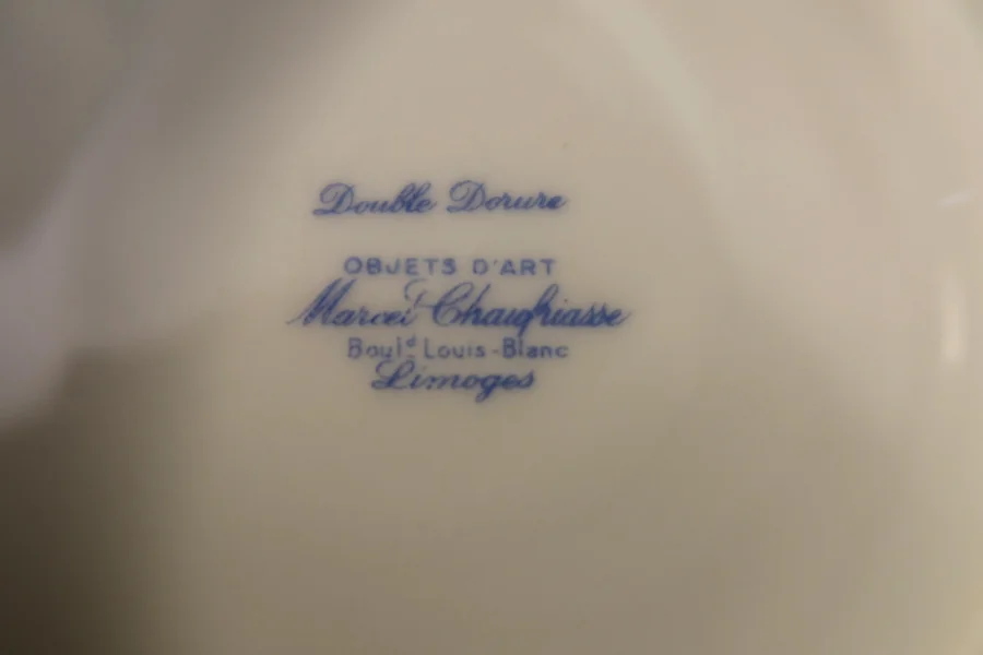 LIMOGES PORCELAIN DINNER AND TEA SERVICE