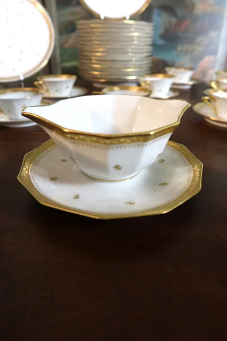 LIMOGES PORCELAIN DINNER AND TEA SERVICE