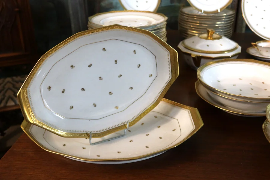 LIMOGES PORCELAIN DINNER AND TEA SERVICE