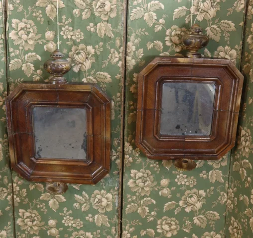 paire de miroirs au bras de lumière