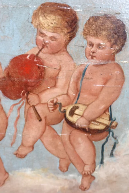 OIL ON CANVAS DEPICTING CHERUBS