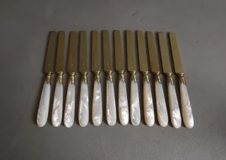 Set of twelve vermeil knives by Cardeilhac