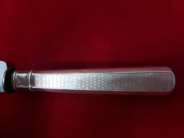 Ménagère de 24 couteaux montés en argent massif