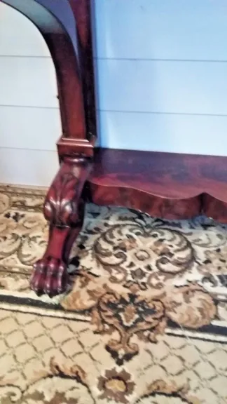 Petite console ouvrant par un tiroir en ceinture Empire en acajou 19ème