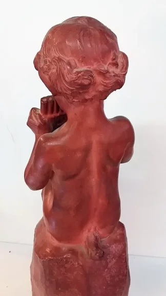 Faune à la flûte de pan par Jean Marie CAMUS (1877-1955) en terre cuite
