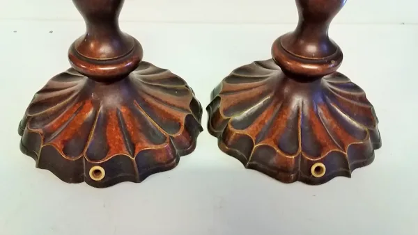 Paire de bougeoirs style louis XIV en bronze patine brune