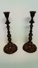 Paire de bougeoirs style louis XIV en bronze patine brune