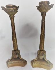 Paire de bougeoirs style louis XVI en bronze patine brune