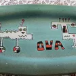 Grand plat oval en gres signé du cachet LR de Rémi Lacombe milieu XXème