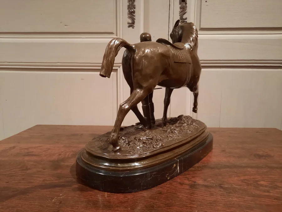 BRONZE JOCKEY AND HORSE