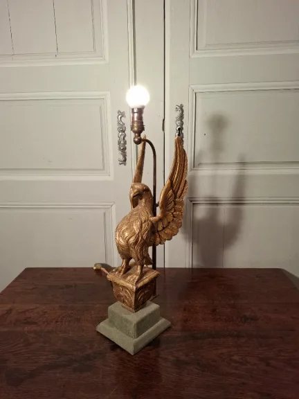 Lampe aigle en bois doré d’époque XIXème siècle.
