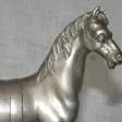 Pendule à "l'étalon Arabe" d'époque Charles X vers 1820 en bronze argenté