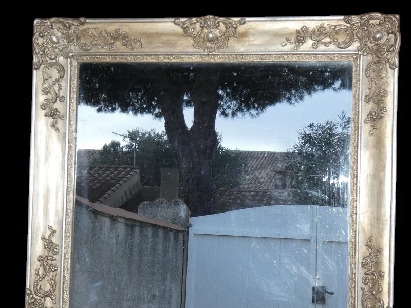 Grand miroir doré à la feuille d'argent époque Restauration vers 1830