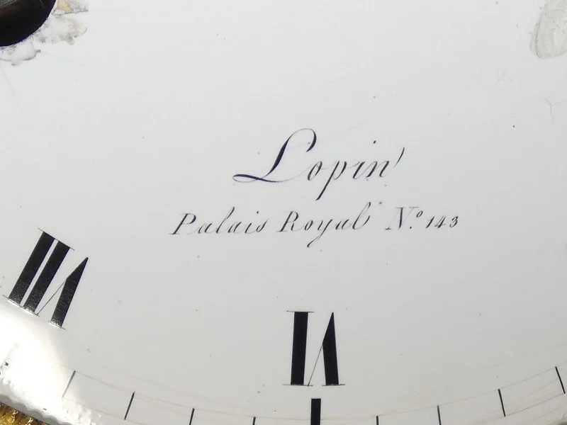 Pendule portique 1er EMPIRE - "LOPIN palais Royal n° 143" Carrare & bronze doré