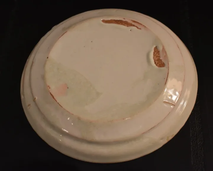 Assiette au  décor de joueur de tambour