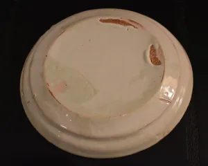 Assiette au  décor de joueur de tambour