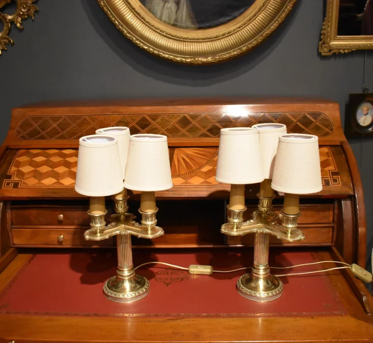 Paire de lampes bougeoirs de style Louis XVI