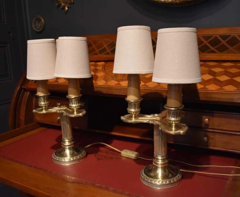 Paire de lampes bougeoirs de style Louis XVI