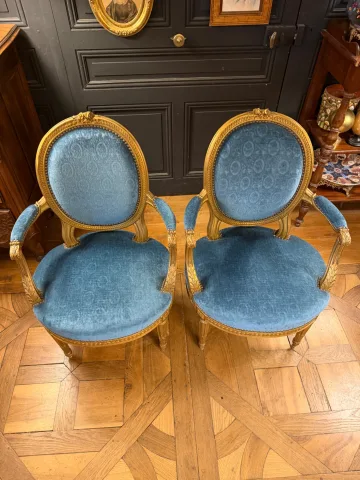 Pair of Louis XVI-style gilt wood cabriolet armchairs — Very good condition