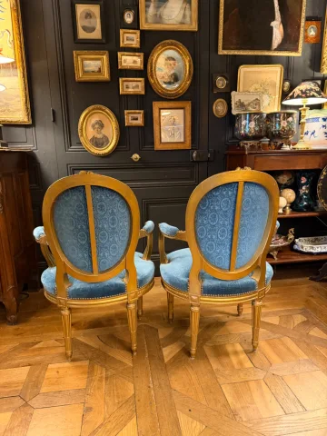 Pair of Louis XVI-style gilt wood cabriolet armchairs — Very good condition