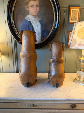 Pair of carved and patinated wood dogs — Very good condition