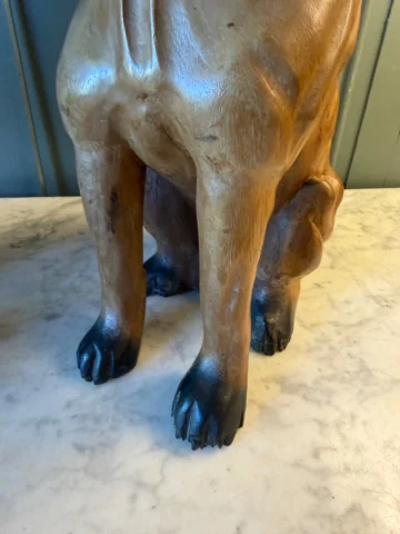 Pair of carved and patinated wood dogs — Very good condition