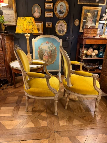 Pair of Louis XVI-style painted wood cabriolet armchairs — Very good condition