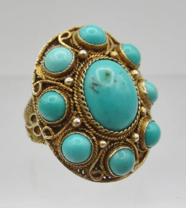 Bague en vermeil sertie de türkiss.