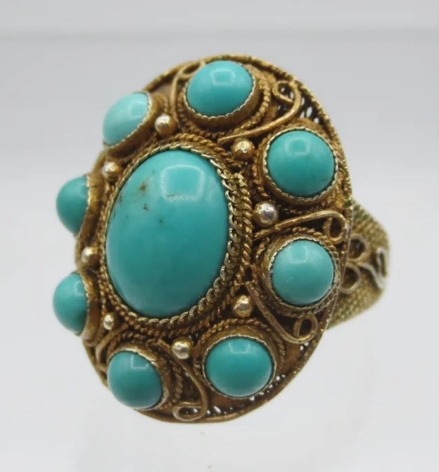Bague en vermeil sertie de türkiss.