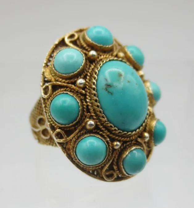 Bague en vermeil sertie de türkiss.