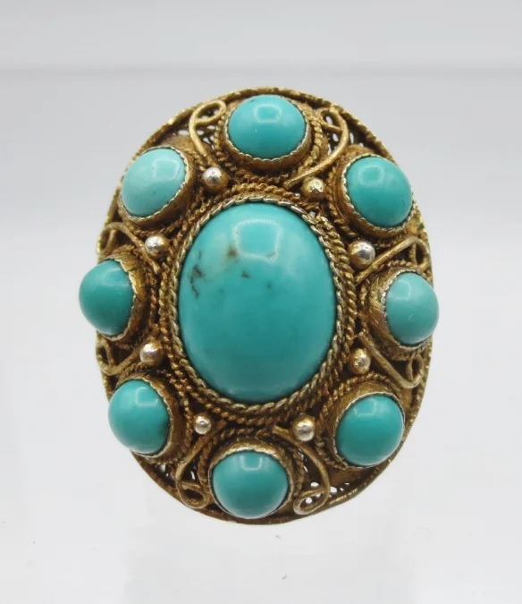 Bague en vermeil sertie de türkiss.