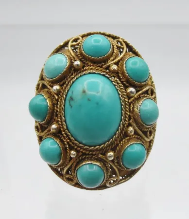 Bague en vermeil sertie de turquoises.