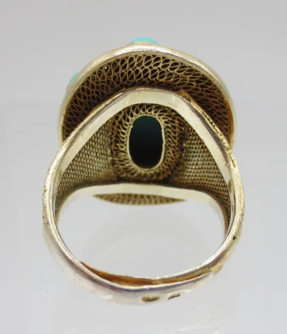 Bague en vermeil sertie de türkiss.