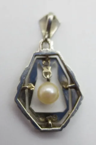 Médaillon Art déco, platine.
