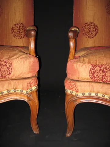 Paire de fauteuils"coin de feu" d'époque Louis XV