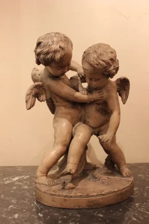 Groupe d'angelots en terre cuite