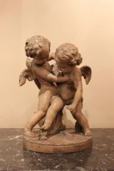 Groupe d'angelots en terre cuite