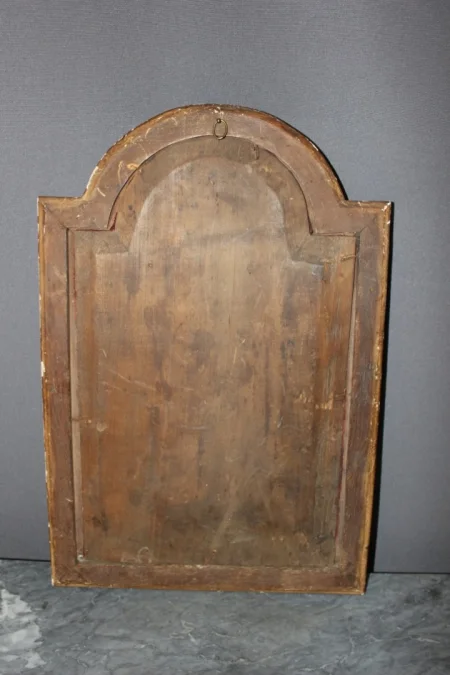 Christ en ivoire XVIII dans son encadrement en bois doré