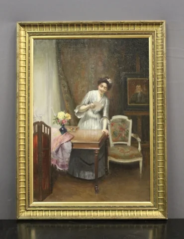Huile sur toile représentant " la femme à la lettre" par Alfred Martin datée 1904