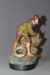 EARTHENWARE FIGURE