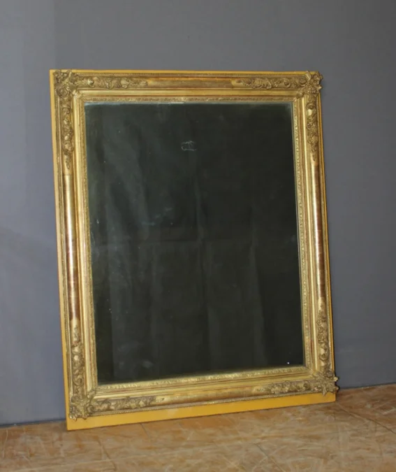 Miroir restauration en stuc doré XIX