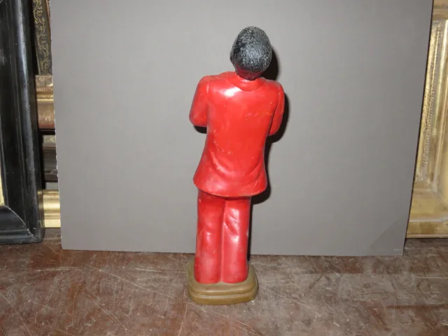 Estatua en porcelana de un músico negro, época 20ème